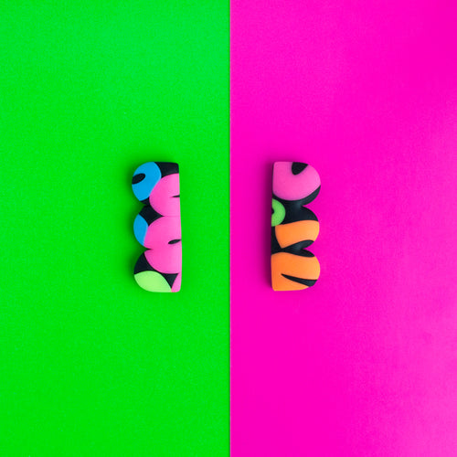Neon studs from the Status Collection! Remember the 80's trend for legwarmers? These earrings remind me of those! A unique one off design and there is only one pair available!