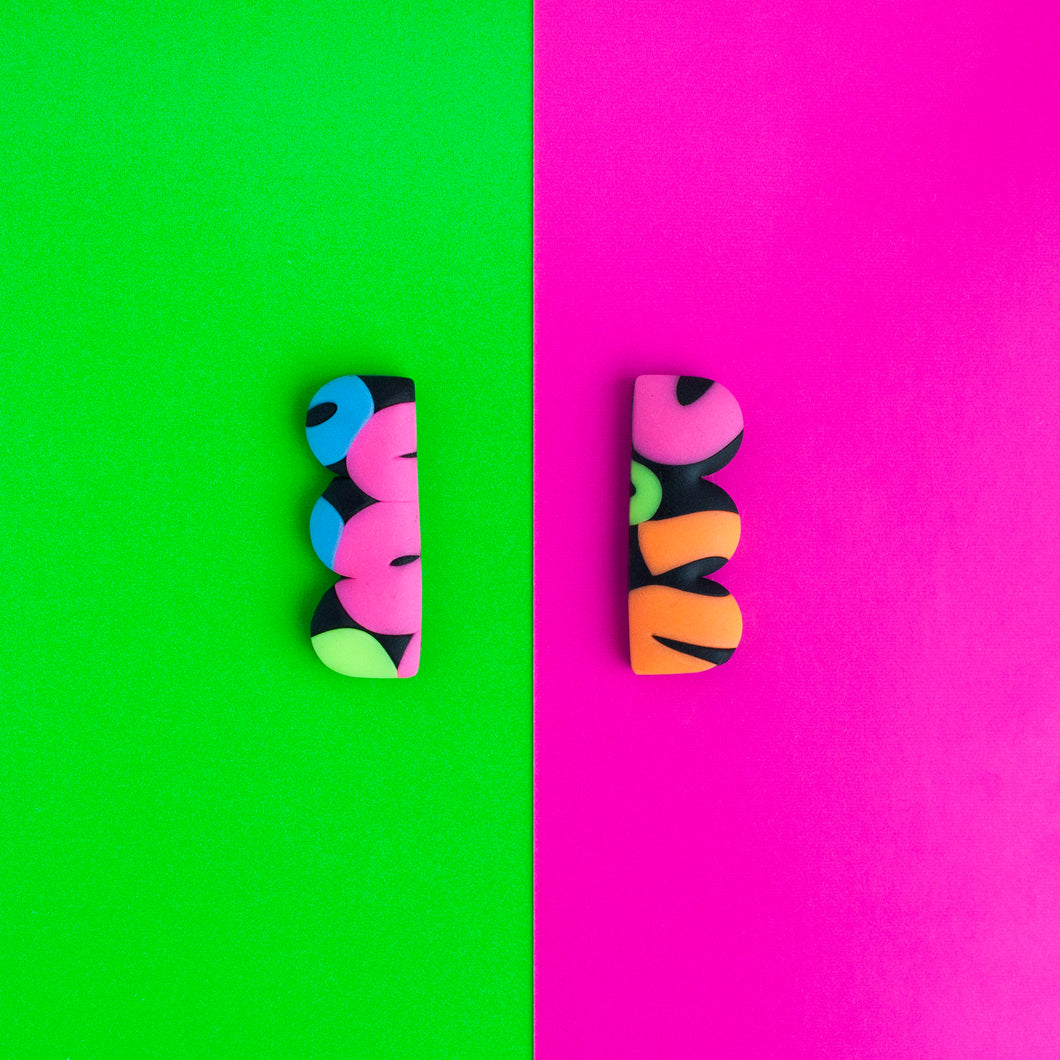 Neon studs from the Status Collection! Remember the 80's trend for legwarmers? These earrings remind me of those! A unique one off design and there is only one pair available!