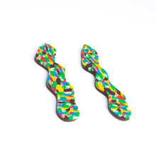 Load image into Gallery viewer, Side view of statement squiggle earrings with a beautiful mosaic pattern of marbled brown, green, cream, bright red, electric blue, mango orange with a chocolate coloured brown base.