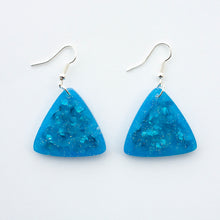 Load image into Gallery viewer, glittery blue resin triangle earrings with silver plated hooks
