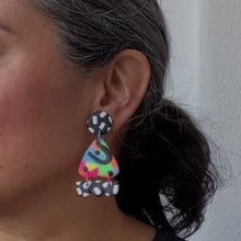 Load image into Gallery viewer, A video still of Vicky from Pink Lime Mango modelling handcrafted earrings for size reference. Bright, bold and colourful Dexy earrings made in Bristol UK