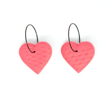 Load image into Gallery viewer, Unique handmade hoops in a beautiful pink colour with a diamond net texture!  The earrings are handcrafted from lightweight polymer clay. Handmade by British artist, Vicky, in her home studio in Bristol, UK.
