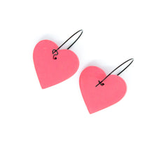 Load image into Gallery viewer, Unique handmade hoops in a beautiful pink colour with a diamond net texture! The earrings are handcrafted from lightweight polymer clay. Handmade by British artist, Vicky, in her home studio in Bristol, UK.