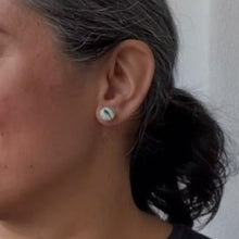 Load image into Gallery viewer, A video still of Vicky from Pink Lime Mango modelling handcrafted earrings for size reference. Bright, bold and colourful earrings made in Bristol UK