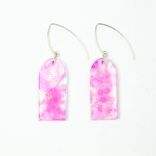 Load image into Gallery viewer, Delicate arches of clear resin with bursts of pale pink and tiny shimmery flower sequins. The unique V shaped earring hooks are made of sterling silver.