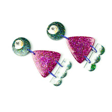 Load image into Gallery viewer, Earrings backs. Handcrafted resin earrings decorated with teal blue and purple glitter. The round stud top has a been jam packed with gorgeous sparkly blue and green glitter. The middle triangle piece is fabulously purple and glittery! The three bumps piece at the bottom has clear resin with teal glitter edging.