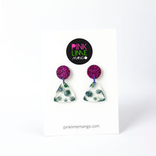 Load image into Gallery viewer, Earrings displayed on a Pink Lime Mango backing card. Handcrafted resin earrings decorated with teal blue and purple glitter. The round stud top has a been jam packed with gorgeous sparkly purple glitter while the base has spots of glitter interspersed throughout the clear resin triangle shape!