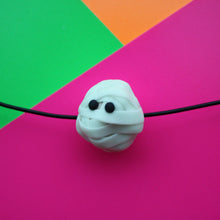 Load image into Gallery viewer, Glow in the Dark Mummy Necklace!
