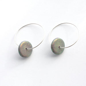 Dazzling iridescent discs with sterling silver hoops!