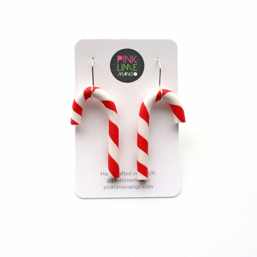Gorgeous candy cane earrings with unique handmade sterling silver earring hooks, which are a completely original design. The earring wires have been specifically made to hold these cute canes in place! Lightweight and comfortable to wear!