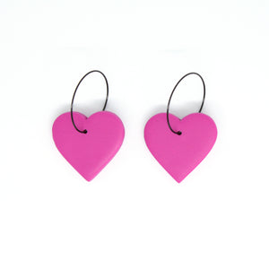 Beautiful vibrant pink hearts with stainless steel black hoops. Lightweight, handcrafted and one of a kind!