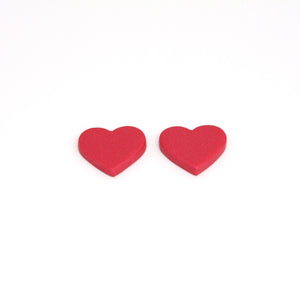 Small red glitter hearts. Featuring silver plated stud posts and backs. Handcrafted and one of a kind!