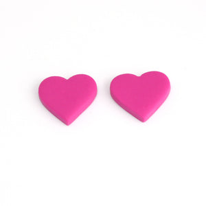 Small pink heart studs. 