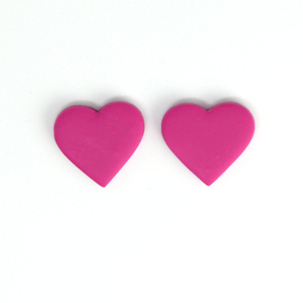 Small pink heart studs. 