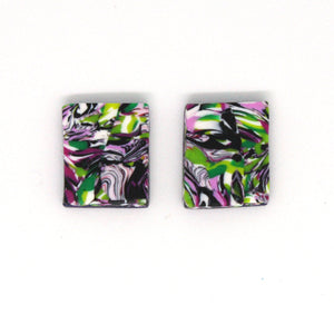 Colourful rectangular studs with unique marbling. 