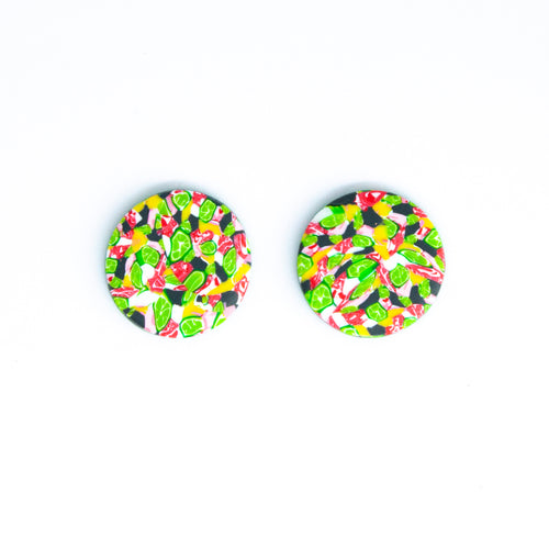 Bright bold and colourful statement studs! They are handcrafted in the UK by Bristol based Artist and Jeweller, Vicky Takooree. The distinctive multi-coloured pattern from Pink Lime Mango includes zesty green lime shapes, dark green, marbled red and white, yellow and pink elements! They are made of very lightweight polymer clay.