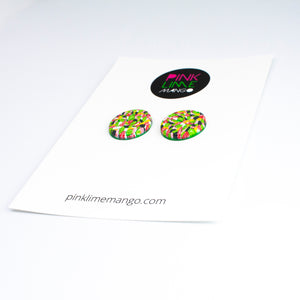 Bright bold and colourful statement studs! They are handcrafted in the UK by Bristol based Artist and Jeweller, Vicky Takooree. The distinctive multi-coloured pattern from Pink Lime Mango includes zesty green lime shapes, dark green, marbled red and white, yellow and pink elements! They are made of very lightweight polymer clay. Attached to a white backing card with the Pink Lime Mango logo at the top.