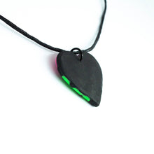 Load image into Gallery viewer, The back of the pendant which is plain black.
