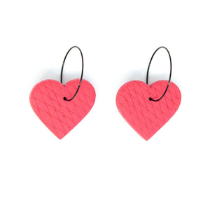 Unique handmade hoops in a beautiful blush pink colour.The textured heart earrings are handcrafted from lightweight polymer clay. Handmade by British artist, Vicky, in her home studio in Bristol, UK.