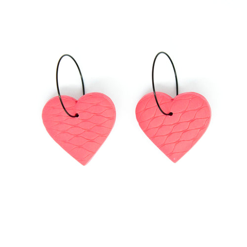 Unique handmade hoops in a beautiful pink colour with a diamond net texture!  The earrings are handcrafted from lightweight polymer clay. Handmade by British artist, Vicky, in her home studio in Bristol, UK.