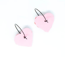 Load image into Gallery viewer, The backs of the Gratitude hoops. Pale pink hearts with black hoops.
