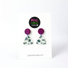 Load image into Gallery viewer, Earrings displayed on a Pink Lime Mango backing card. Handcrafted resin earrings decorated with teal blue and purple glitter. The round stud top has a been jam packed with gorgeous sparkly purple glitter while the base has spots of glitter interspersed throughout the clear resin triangle shape!
